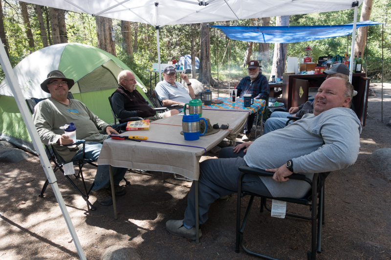 men at breakfast table