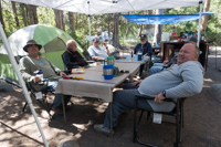men sitting at table