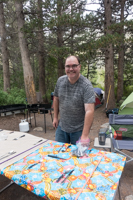 man setting tableware