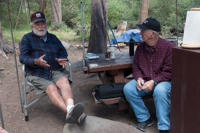 man in chair talking